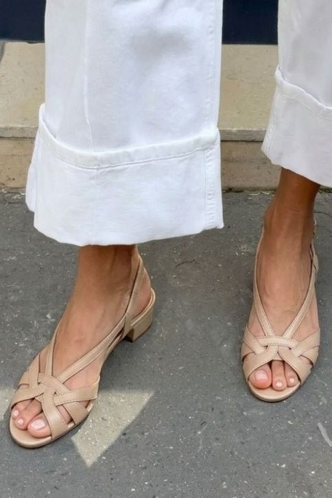 Nude leather slingback sandals with crossover straps and low heel