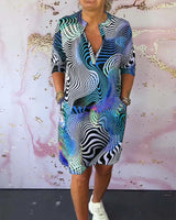 Ria - Vestido colorido con cuello en V
