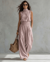 Maria | An elegant outfit comprising palazzo trousers and a top