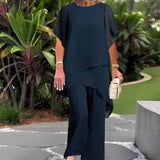 Nuria - Conjunto elegante con top asimétrico y pantalón ancho