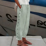 Salma - Pantalón recto de rayas con botones laterales