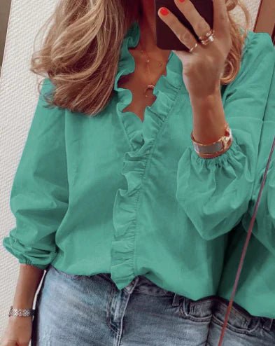 Carla - Blusa de corte holgado con volantes y mangas farol