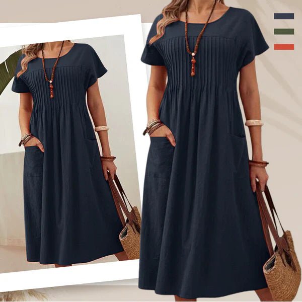 Irene - Vestido plisado con mangas cortas y bolsillos