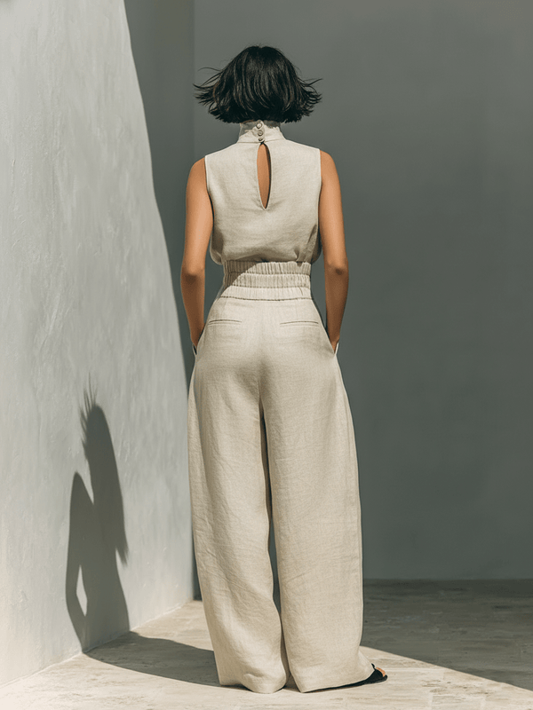 Maria | An elegant outfit comprising palazzo trousers and a top