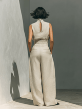 Maria | An elegant outfit comprising palazzo trousers and a top