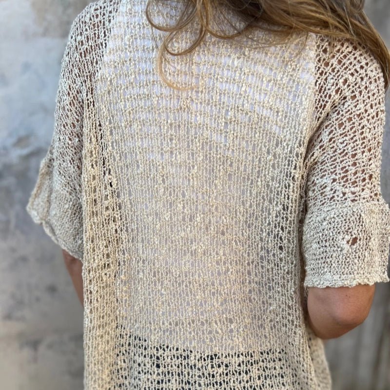 Sara - Blusa de punto con botón