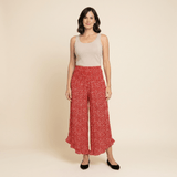 Adela - Pantalón fluido de lunares con volante