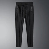 Noa - pantalón casual unisex, extremadamente suave y flexible con caída elegante