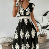 Candela - Vestido maxi barroco con escote en V