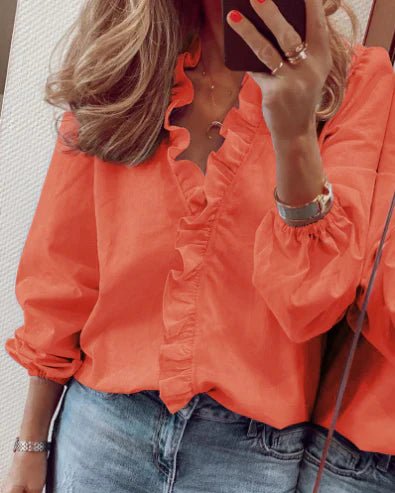 Carla - Blusa de corte holgado con volantes y mangas farol