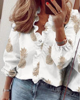Carla - Blusa de corte holgado con volantes y mangas farol