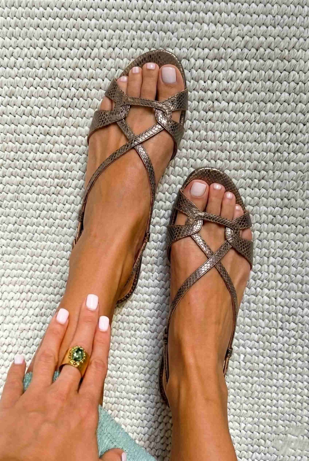 Low-heeled bronze open-toe slingback sandals with a snakeskin-effect finish