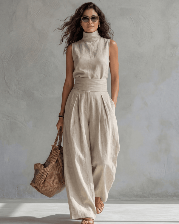 Maria | An elegant outfit comprising palazzo trousers and a top