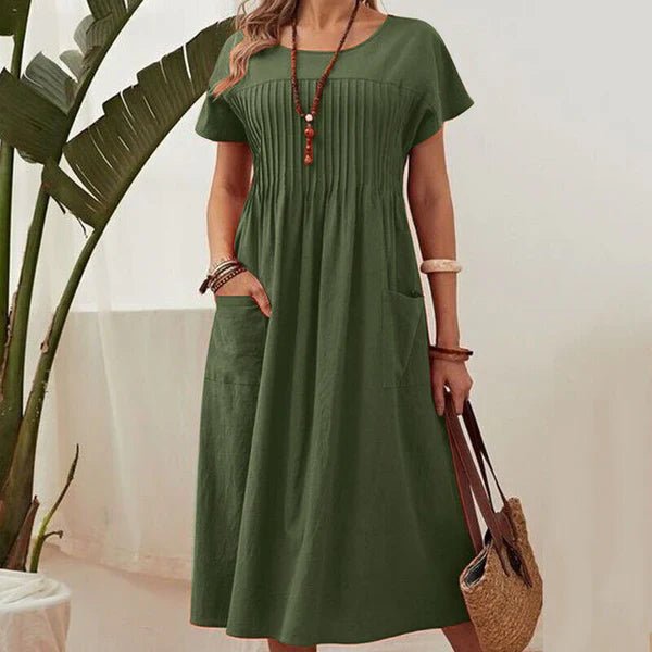 Irene - Vestido plisado con mangas cortas y bolsillos