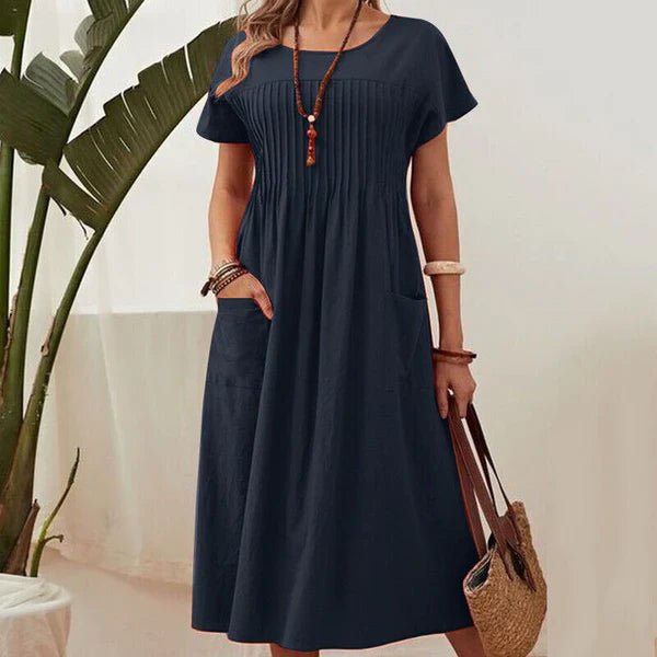 Irene - Vestido plisado con mangas cortas y bolsillos