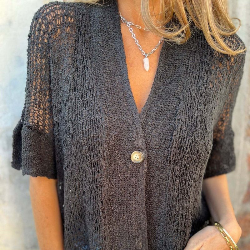Sara - Blusa de punto con botón