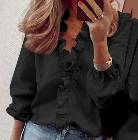 Carla - Blusa de corte holgado con volantes y mangas farol