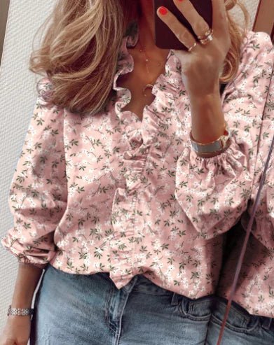Carla - Blusa de corte holgado con volantes y mangas farol