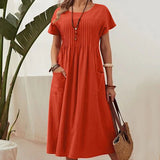 Irene - Vestido plisado con mangas cortas y bolsillos
